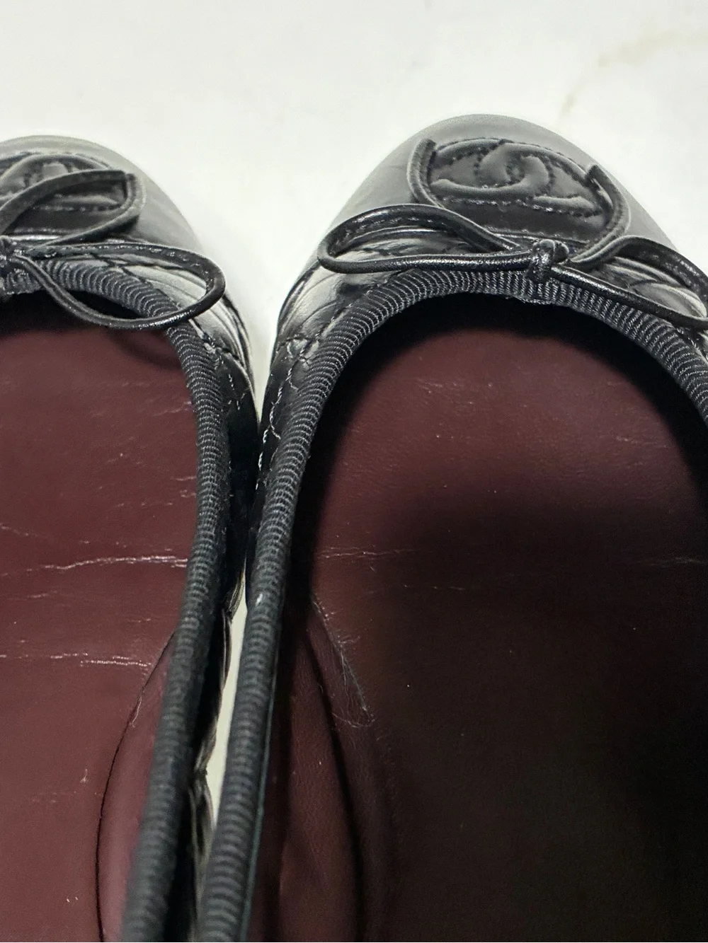 CHANEL Black Quilted Leather Ballet Flats with CC Medallion